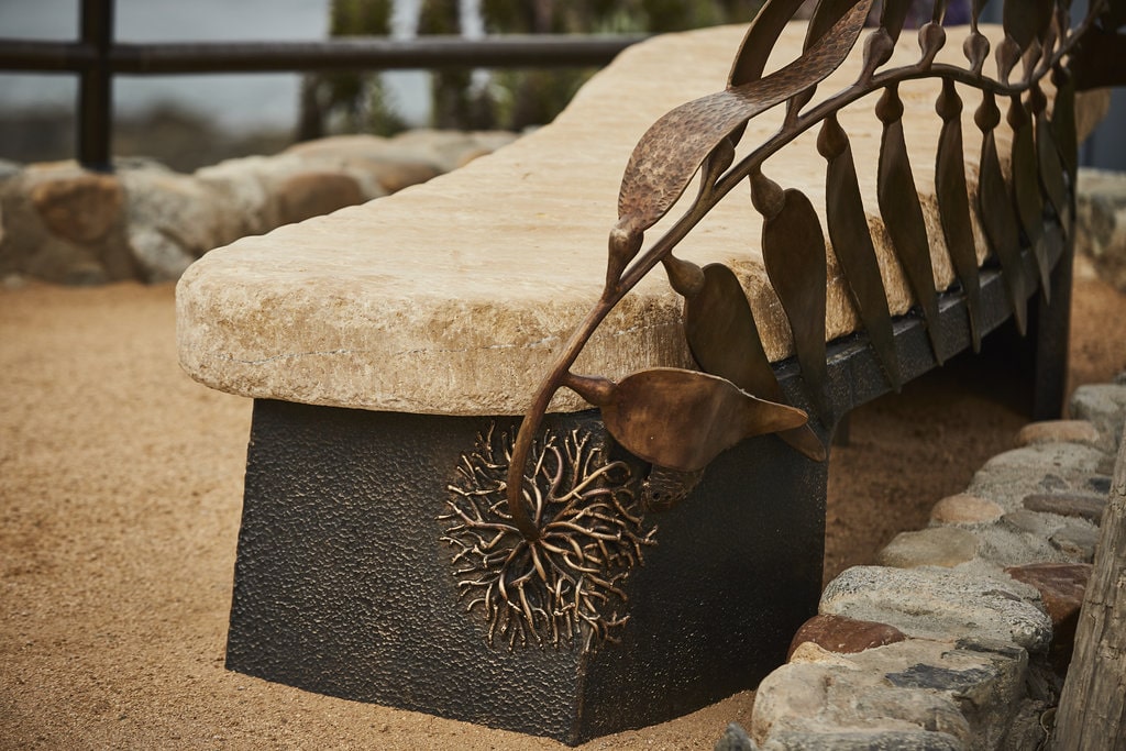 stone and bronze kelp bench heisler park