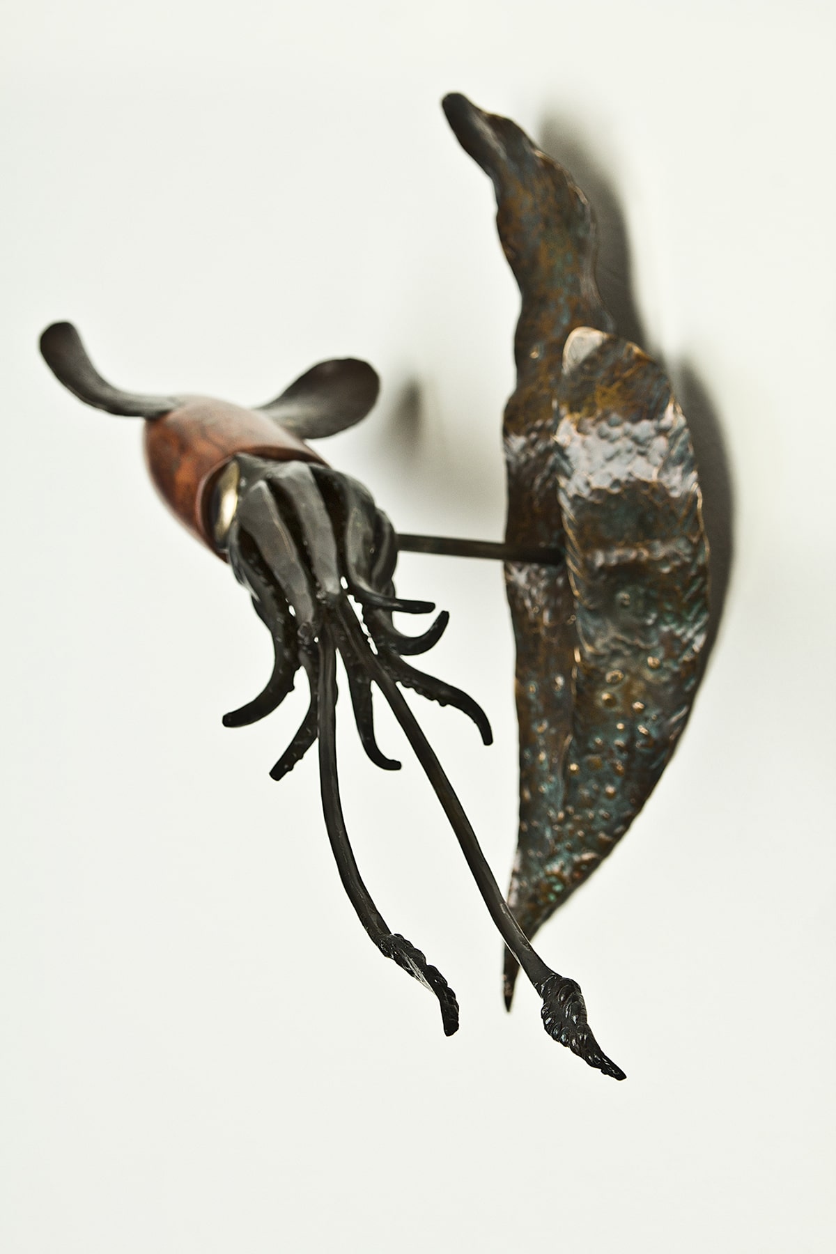 metal and wood squid sculpture laguna beach