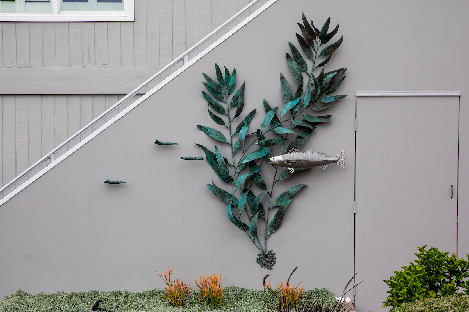 bronze kelp and stainless steel fish sculpture