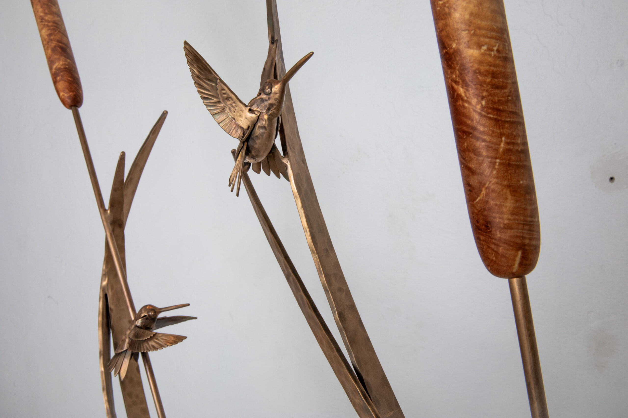 Bronze and wood hummingbird sculpture