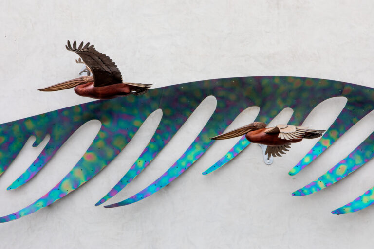 Redwood pelicans with bronze wings public art Laguna Beach